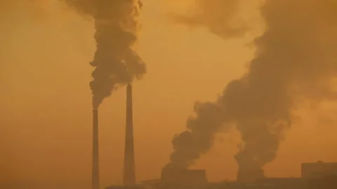 Pipe air polluting against sunset Stock Footage 87770901