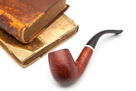 Pipe and book Stock Photos