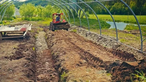 Pipe Arch Greenhouse Construction in Rural Norway 스톡 동영상 343361022