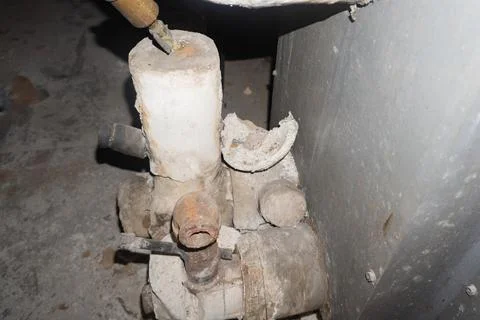 Pipe with asbestos pipe insulation. Stock Photos