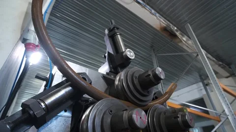 Pipe bender, machine for bending pipes in production Stockbeeldmateriaal 273085113