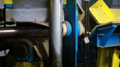 Pipe bending machine rollers close up. Heavy equipment metalworking plant shop. Stock Footage 345611383