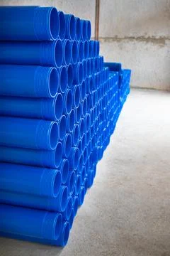 Pipe blue plastic. Finished plastic pipes industry. Texture and background. P Stock Photos