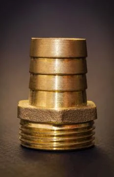 Pipe brass fitting used for connecting pipes in plumbing Stock Photos