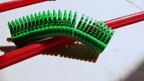 Pipe clamps for underfloor heating installers, fastening plastic pipes Stock Footage 315507605
