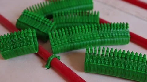 Pipe clamps for underfloor heating installers, fastening plastic pipes Stock Footage 315507607