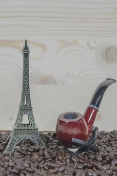 Pipe, coffee bean Stock Photos