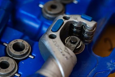 Pipe Cutter and Press Tools in Blue Case Stock Photos