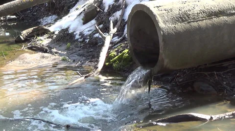 Pipe into the drainage hole through which sewage flows Stock Footage 36036357