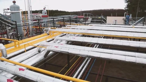 Pipe, gauge and tank system with natural gas and fuel at gas pipeline processing Stock Footage 225522555