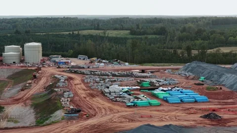 Pipe laydown and storage tanks at a data center build, Louisa County Stock Footage 346333816