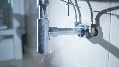 Pipe leaking in the bathroom Stock Footage 148544147