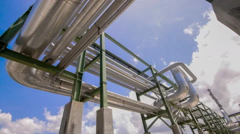 Pipe line transfer structure with cloudy sky , Time Lapse Stock Footage 65249466