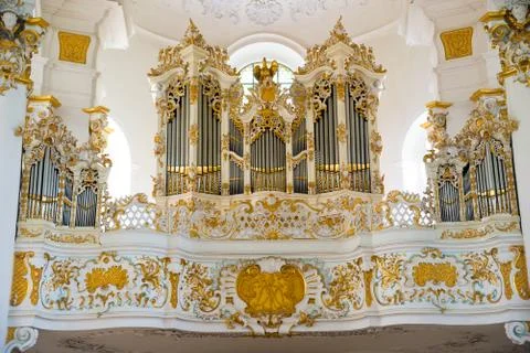 The pipe organ in Pilgrimage Church of Wies. Bavaria, Germany. Stock Photos