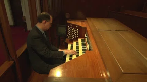 Pipe organist playing side medium (untrimmed) Stock Footage 10712799