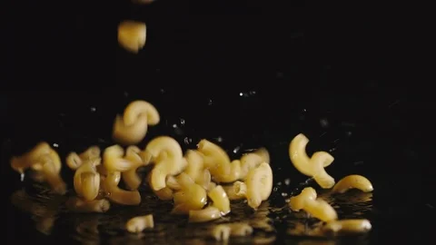 Pipe rigate fall into water - Slow Motion Stock Footage 98384701