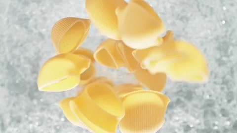 Pipe Rigate Pasta Falling into Pot of Boiling Water Stock Footage 271398067