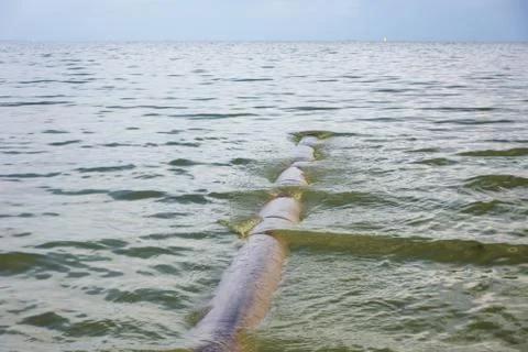 The pipe in the sea Stock Photos