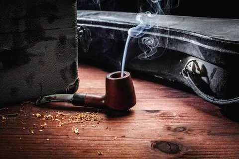 Pipe smoke and old object Stock Photos