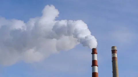 The pipe smokes against the blue sky. Stock Footage 101053987