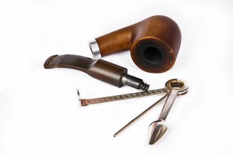 Pipe smoking set on white background Stock Photos