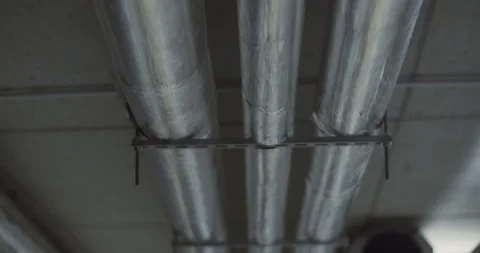 Pipe system installation hanging from the ceiling Stock Footage 127706391