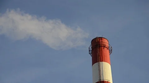 The pipe of the thermal power plant from which smoke comes Stock Footage 122934942