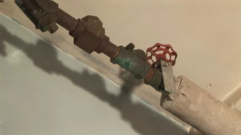 Pipe valve in engine room on Coast Guard Cutter in Baltimore, Maryland USA Stock Footage 105547123