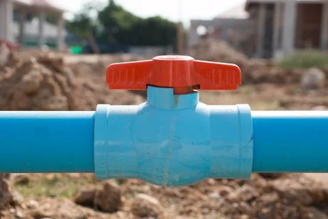 Pipe valve in housing project construction Foto stock
