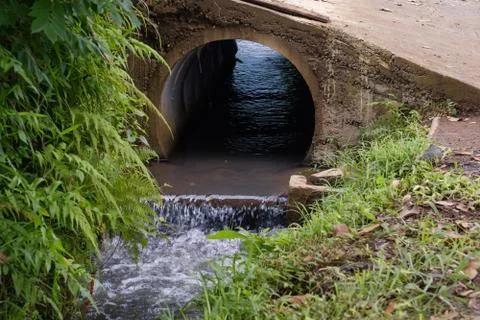 Pipe with water after rain Stock Photos