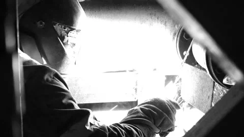Pipe welding in monochrome in slow motion Stock Footage 246437812