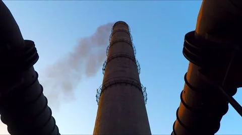 The pipe from which goes smoke. Gas outlet connected to a pipe Video stock 68763390