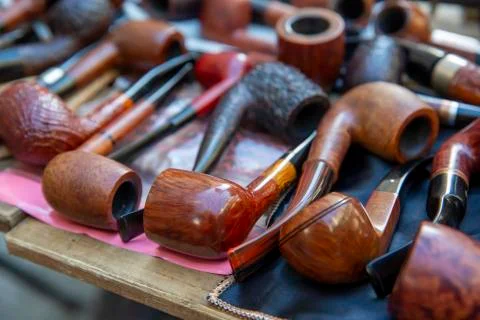 Pipe on wooden table, selective focus Foto stock