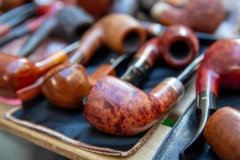Pipe on wooden table, selective focus Foto stock