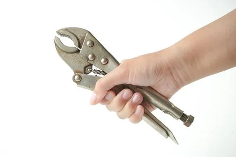 Pipe wrench in hand Foto stock