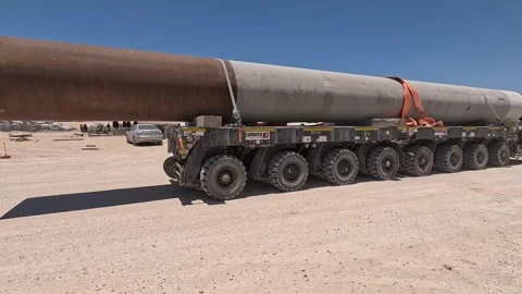 Pipeline transportation in construction site. Stock Footage 245430596