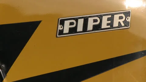 Piper Cub in Hangar Stock Footage 23653704