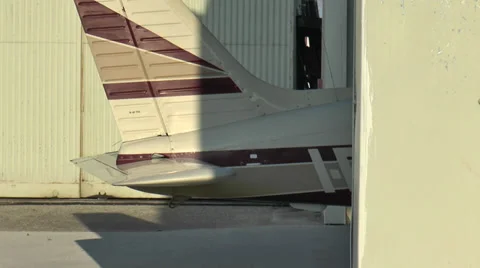 Piper PA 28 is pulled out of the hangar - Rimini Video stock 33721368