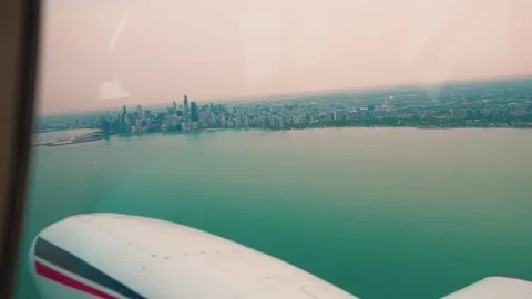 Piper wing frames Chicago's North Side: Gold Coast towers, Lincoln Park Stock Footage 331900415