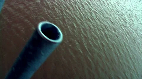 Pipes along the river Stock Footage 8682804