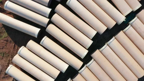Pipes on construction site - white tubes for crude oil or natural gas pipeline Video stock 167694491
