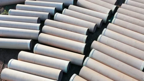 Pipes on construction site - white tubes for crude oil or natural gas pipeline Stock Footage 167700244