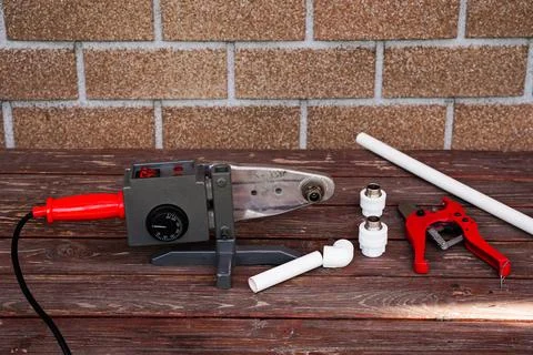 Pipes of sanitary engineering welded plastic. Ppr Pipe welding tool Stock Photos