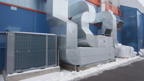 Pipes of ventilation and heating systems at modern factory Stock Footage 230039344