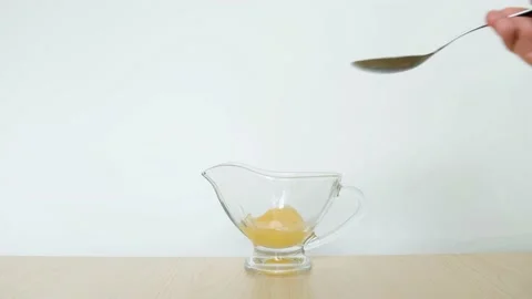 Pipette adding fluid to one of several test tubes. Stock Footage 131662703