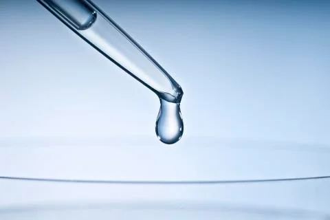 Pipette with drop 写真素材