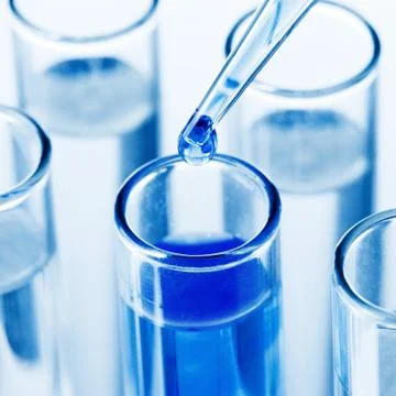 Pipette dropping a sample Foto stock