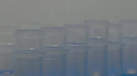 Pipette Dropping A Transparent Sample Video stock 61457589