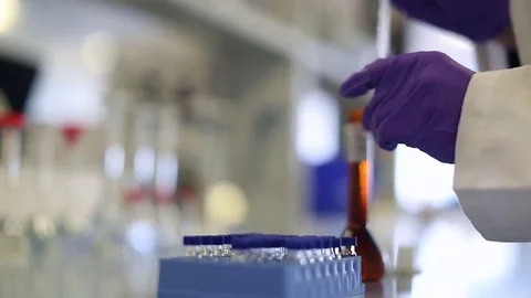 Pipette Filling Vial with Solution Stock Footage 69087460