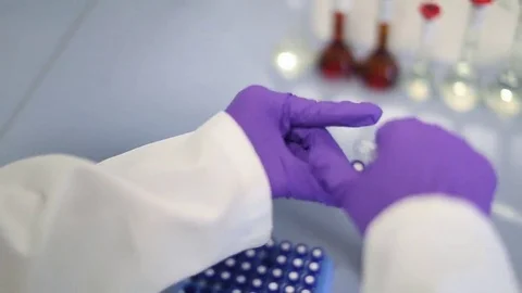 Pipette Filling Vial with Solution Stock Footage 69087849